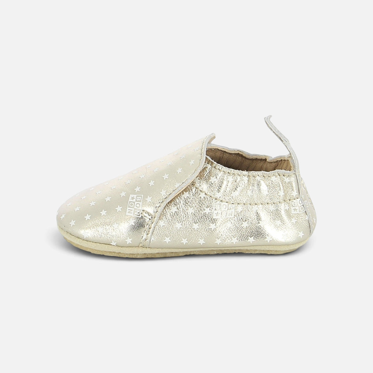 Chaussons souples Shoo Pom dorés en cuir avec motif étoiles blanches pour bébé