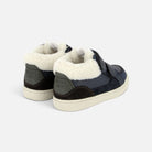Baskets montantes Shoo Pom bleu marine en cuir avec doublure en fausse fourrure blanche et fermeture à scratch