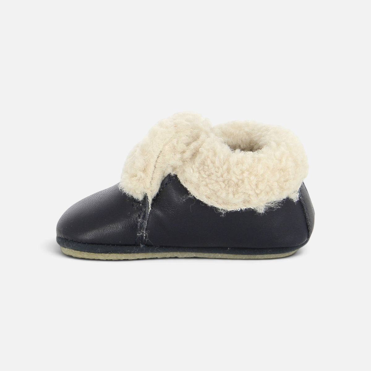 Chaussons Shoo Pom en cuir bleu marine avec doublure en laine de mouton beige pour bébé