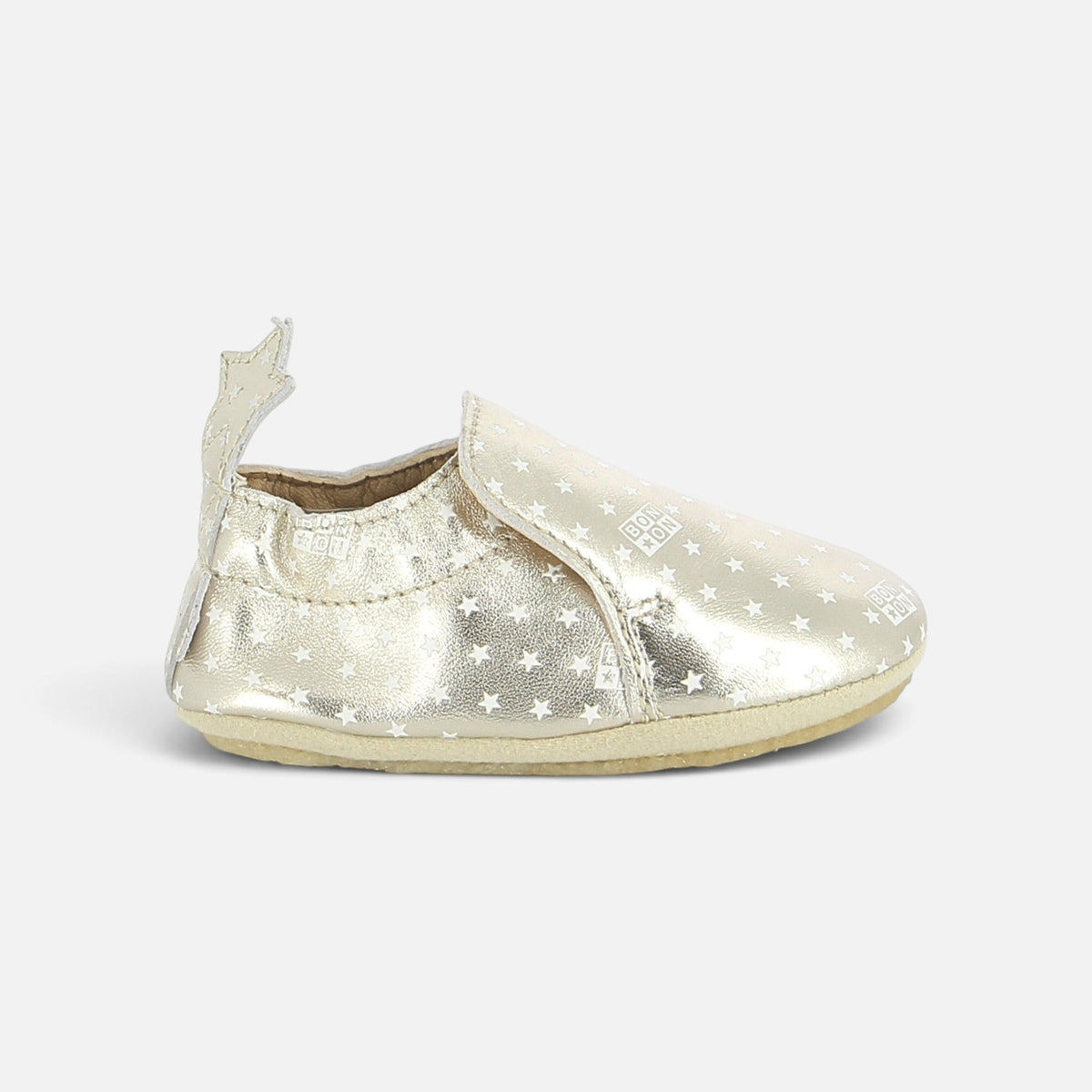 Chaussons souples Shoo Pom dorés en cuir avec motif étoiles blanches et languette en forme d'étoile